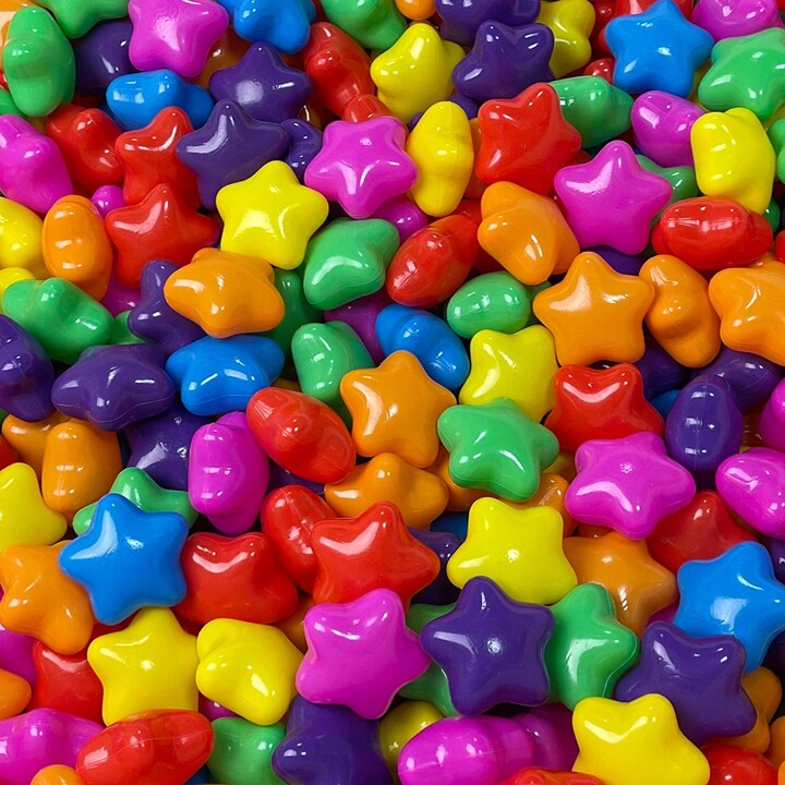 A colourful mix of star-shaped ball pit balls