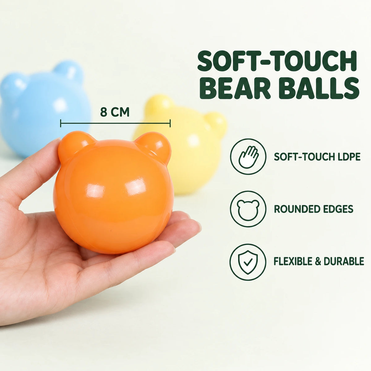 Orange 8 cm bear-shaped ball showing soft-touch LDPE material, rounded edges and flexible construction.