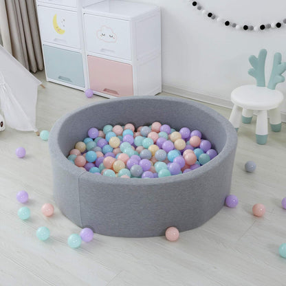 Mixed pastel 8 cm ball pit balls in a grey round ball pit