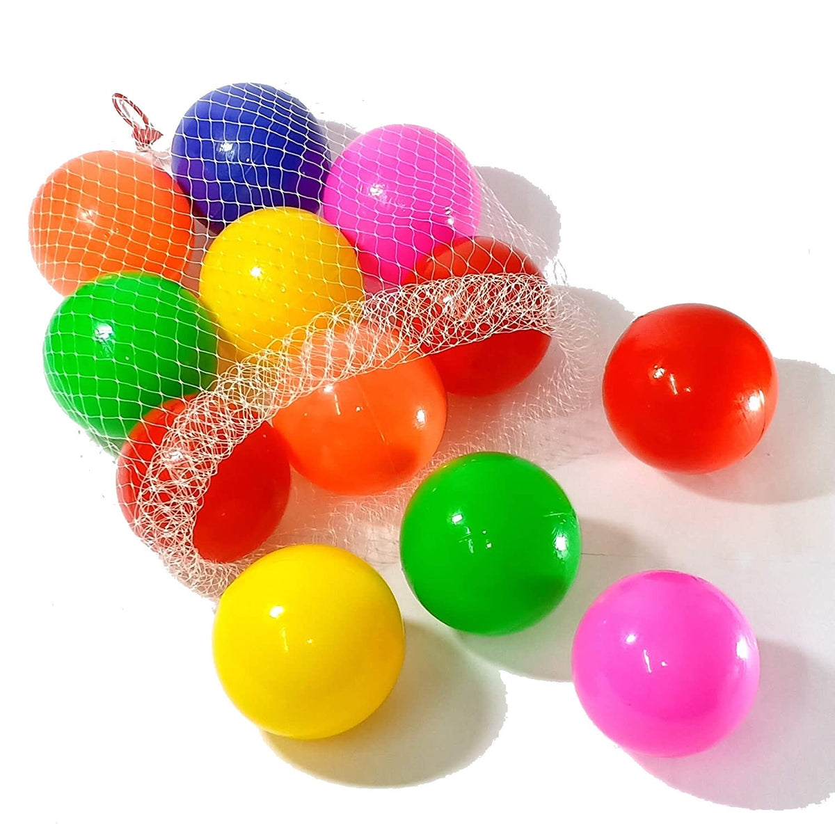 Bright multicolour round plastic ball pit balls spilling from a white mesh bag